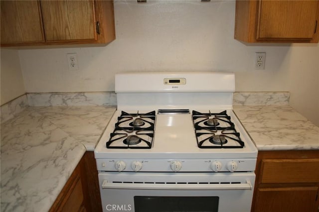 kitchen featuring gas range gas stove