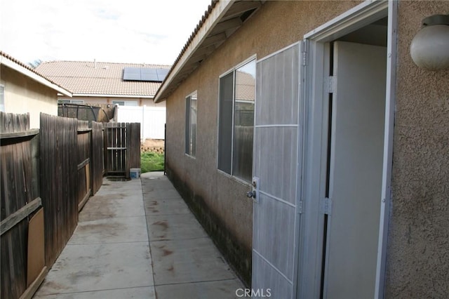 view of home's exterior with a patio area