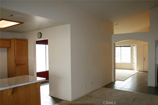 interior space featuring light tile patterned floors