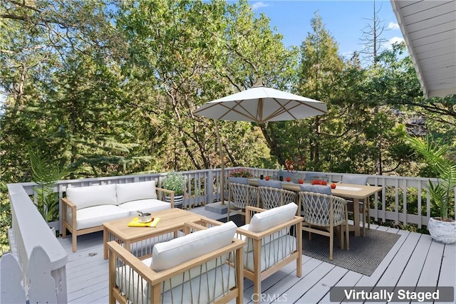 wooden terrace featuring an outdoor living space