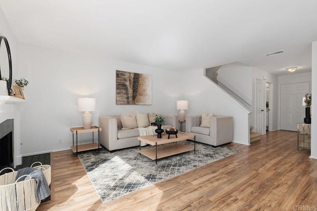 living room with wood-type flooring