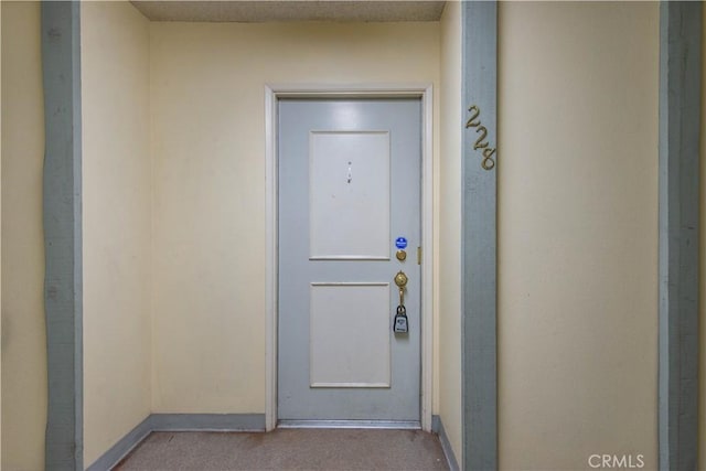 23515 Lyons Ave Unit 228, Valencia, CA 91355 - property entrance featuring stucco siding