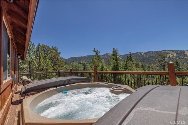 43625 Wolf Rd, Big Bear Lake, CA 92315 - deck featuring a mountain view and a covered hot tub
