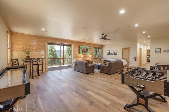 43625 Wolf Rd, Big Bear Lake, CA 92315 - playroom with ceiling fan, light hardwood / wood-style floors, and wood walls