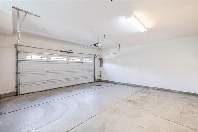 22059 Barrington Way, Saugus, CA 91350 - garage with a garage door opener and baseboards