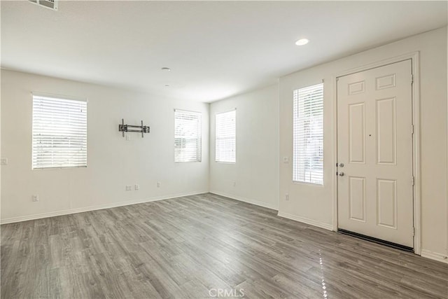 22059 Barrington Way, Saugus, CA 91350 - foyer with wood finished floors, baseboards, and recessed lighting