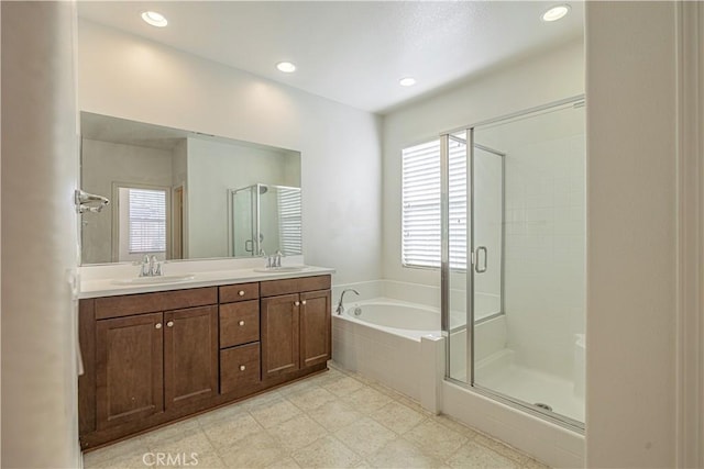 22059 Barrington Way, Saugus, CA 91350 - full bath with a garden tub, a shower stall, double vanity, and recessed lighting