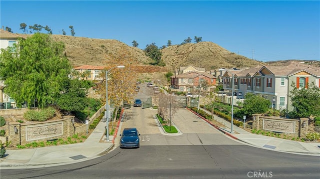 22059 Barrington Way, Saugus, CA 91350 - view of front of house with a mountain view and a residential view