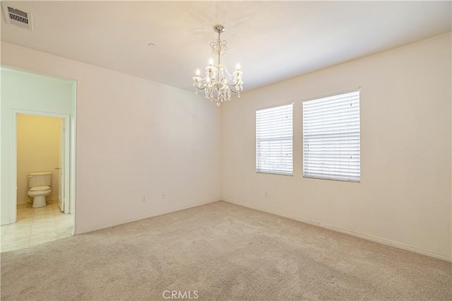 22059 Barrington Way, Saugus, CA 91350 - unfurnished room featuring light colored carpet and a chandelier
