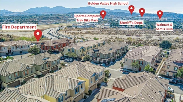 22059 Barrington Way, Saugus, CA 91350 - aerial view of residential area featuring a mountainous background