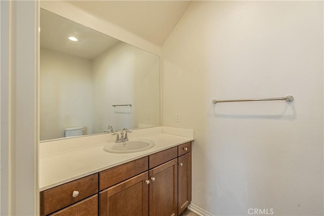 22059 Barrington Way, Saugus, CA 91350 - bathroom featuring vanity, toilet, and baseboards
