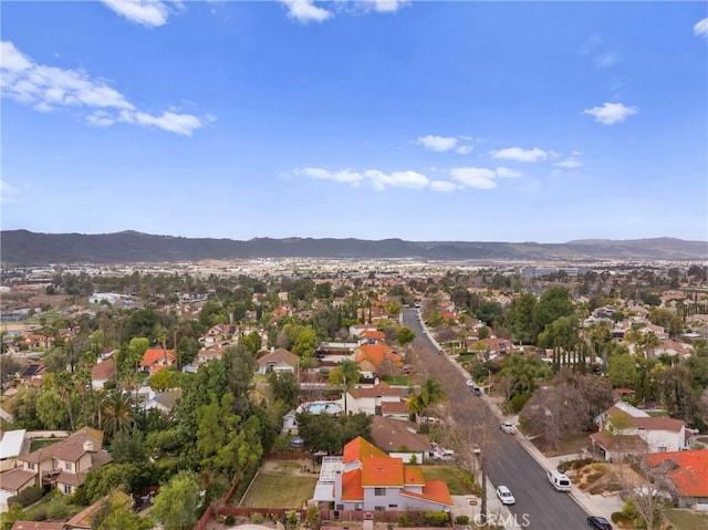 drone / aerial view featuring a mountain view