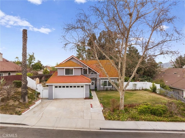 view of front facade featuring a garage and a front yard