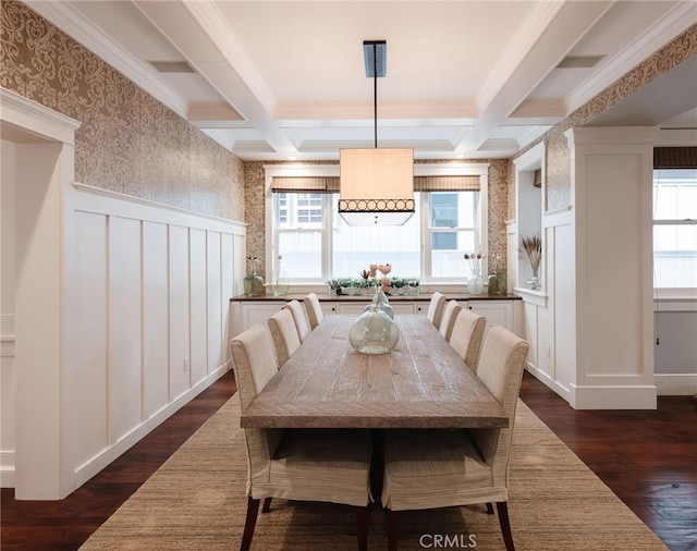 dining room with coffered ceiling, dark hardwood / wood-style flooring, ornamental molding, and beamed ceiling