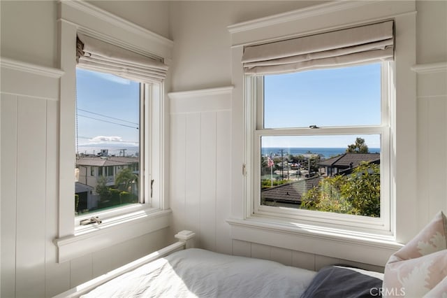 bedroom with multiple windows