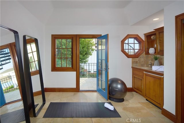 doorway featuring sink and french doors