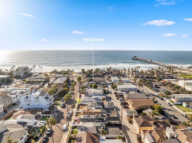 aerial view with a water view and a residential view