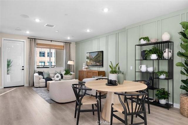 dining area featuring light hardwood / wood-style floors