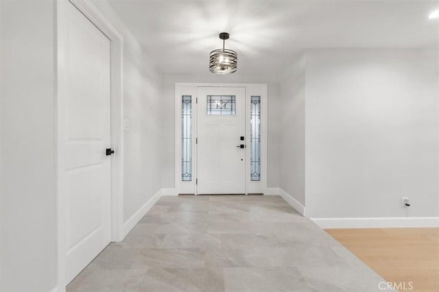 entrance foyer with light wood-type flooring