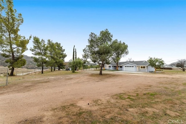 view of yard featuring a garage