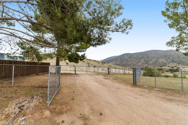 view of street featuring a rural view and a mountain view