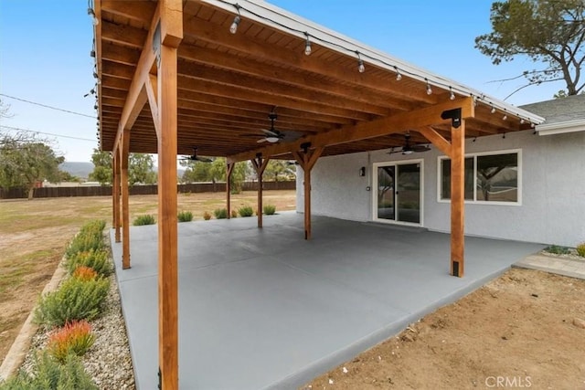 view of patio / terrace featuring ceiling fan