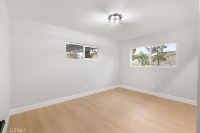 empty room featuring light hardwood / wood-style floors