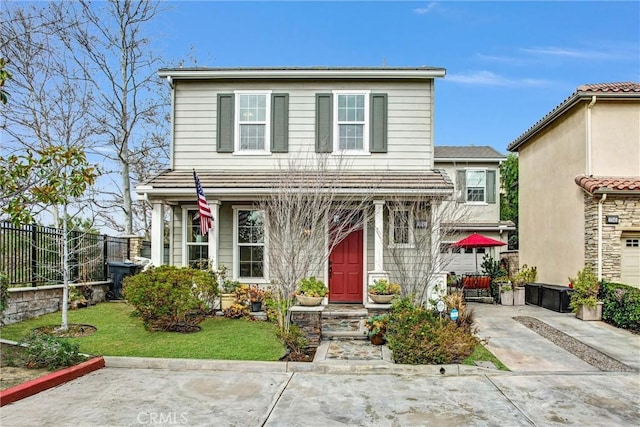 view of front property featuring a front yard