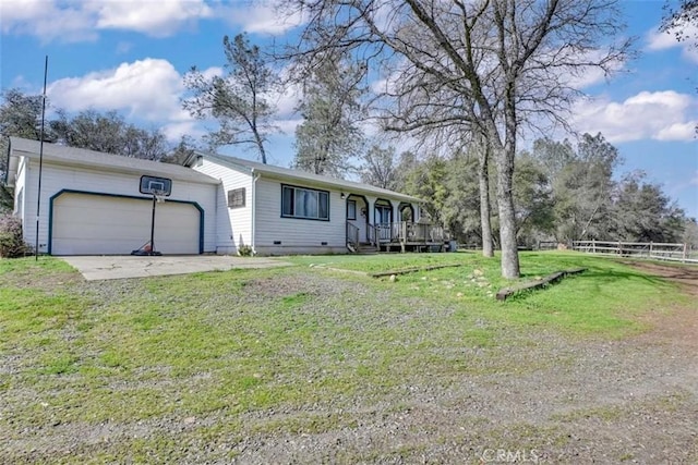 ranch-style house with a front lawn and a garage