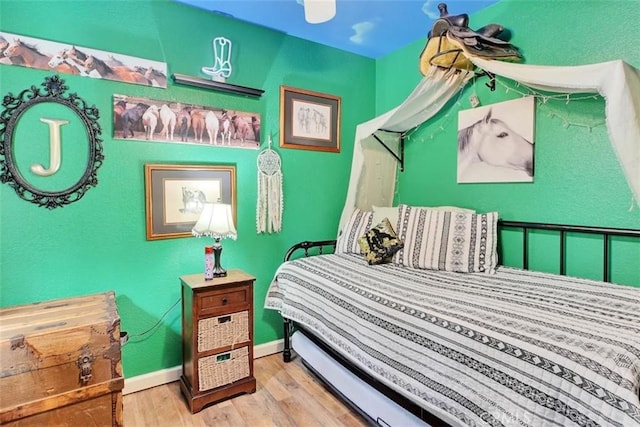 bedroom featuring hardwood / wood-style floors