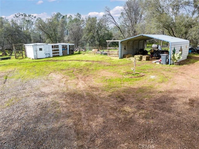 view of yard with a carport