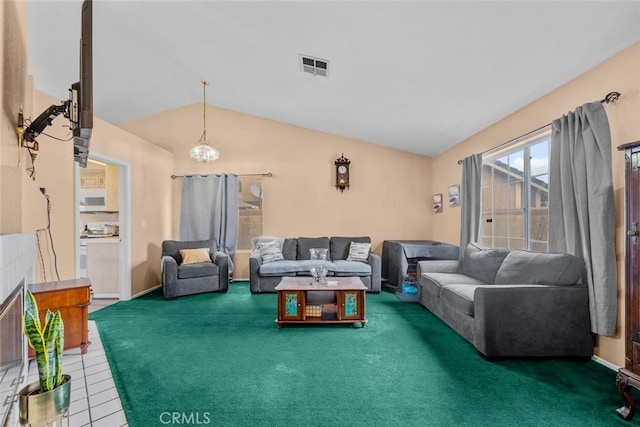 living room with vaulted ceiling