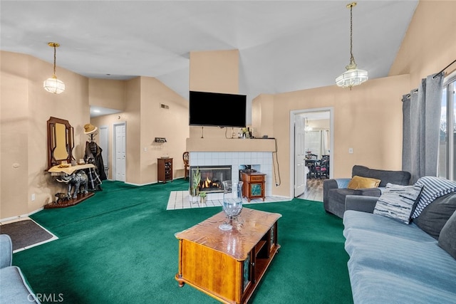 living room with a fireplace and vaulted ceiling