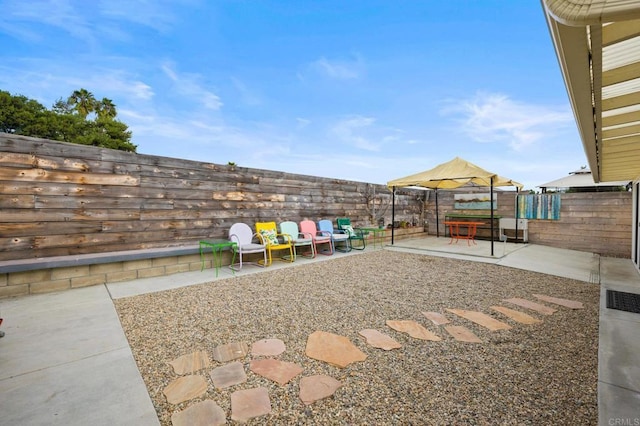 view of yard featuring a patio