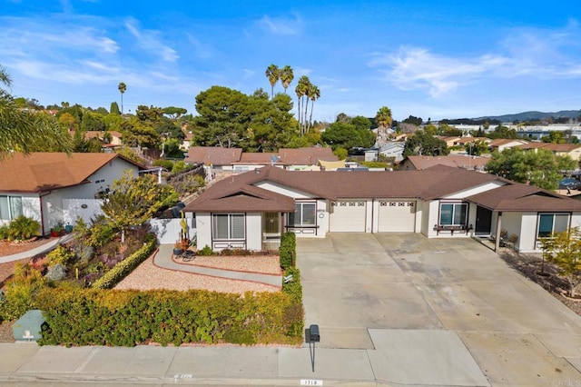 ranch-style home with a garage