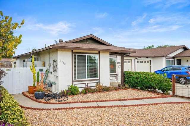 ranch-style home with a garage