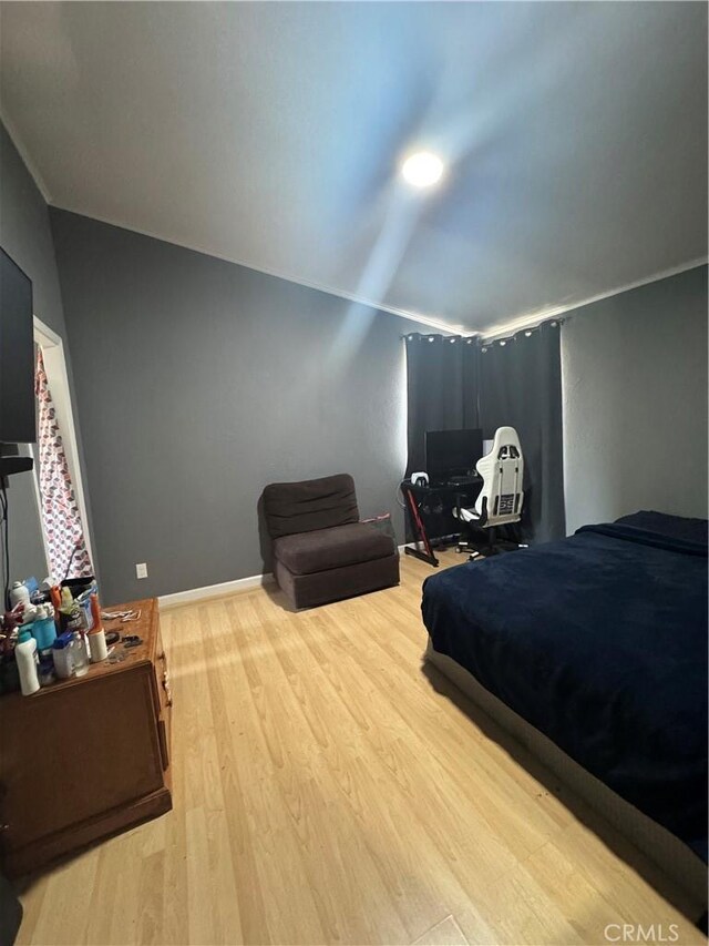 8734 Nevada Rd, Phelan, CA 92371 - bedroom featuring light wood-type flooring and lofted ceiling