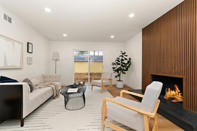 living room with light hardwood / wood-style floors