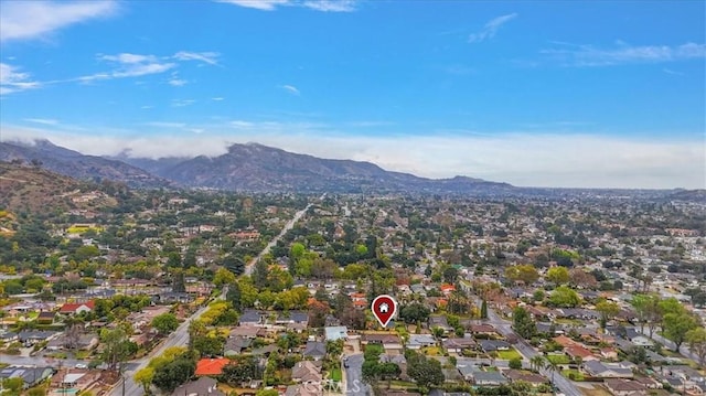 drone / aerial view featuring a mountain view