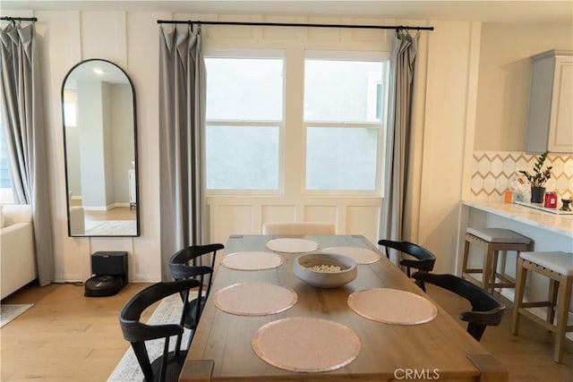 dining room with light wood-type flooring