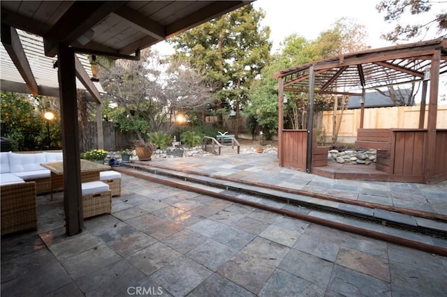 view of patio with a fenced backyard and outdoor lounge area