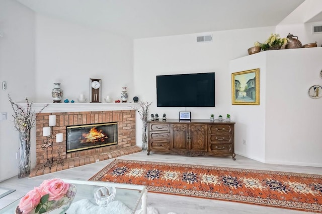 living room featuring a fireplace