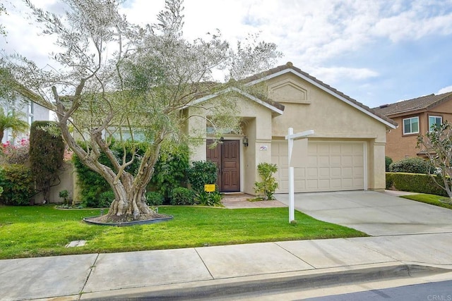 view of front facade featuring a garage and a front lawn