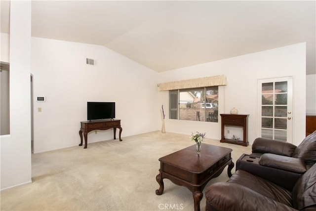 2869 Maple Dr, Hemet, CA 92545 - living room featuring lofted ceiling and light colored carpet