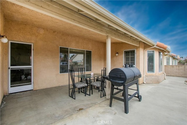 2869 Maple Dr, Hemet, CA 92545 - view of patio / terrace featuring fence and outdoor dining space