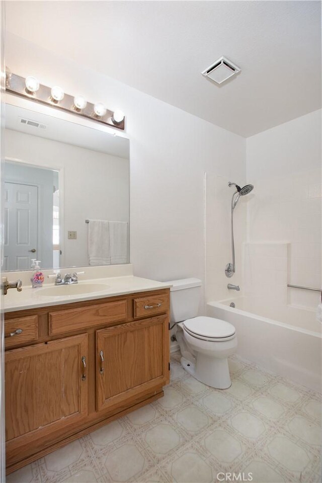 2869 Maple Dr, Hemet, CA 92545 - full bath featuring toilet, bathtub / shower combination, and vanity