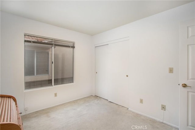 2869 Maple Dr, Hemet, CA 92545 - unfurnished bedroom with a closet, carpet flooring, and baseboards