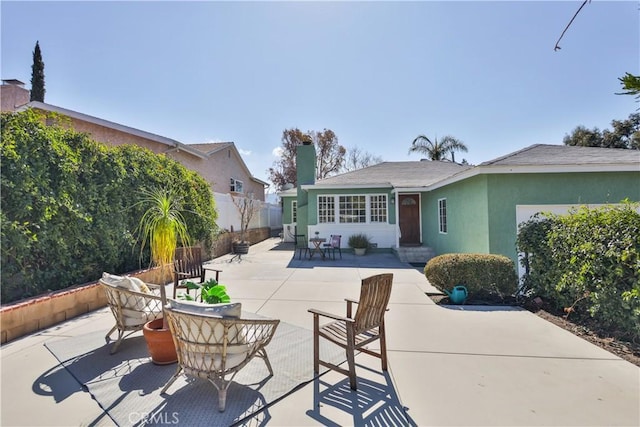 back of house featuring a patio