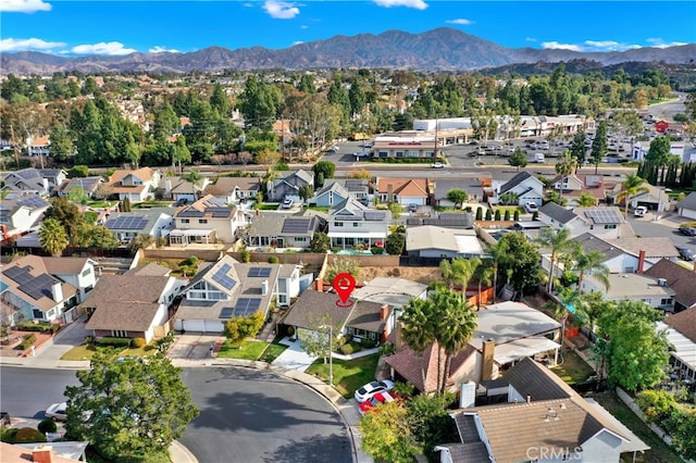 drone / aerial view featuring a mountain view