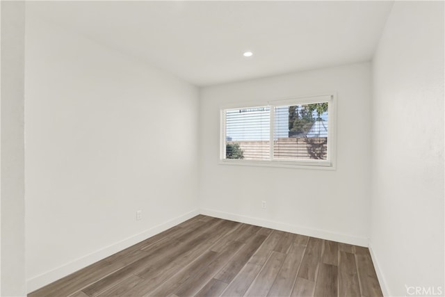 empty room featuring hardwood / wood-style floors